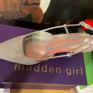 Rinstone heels, never worn. But tried on.